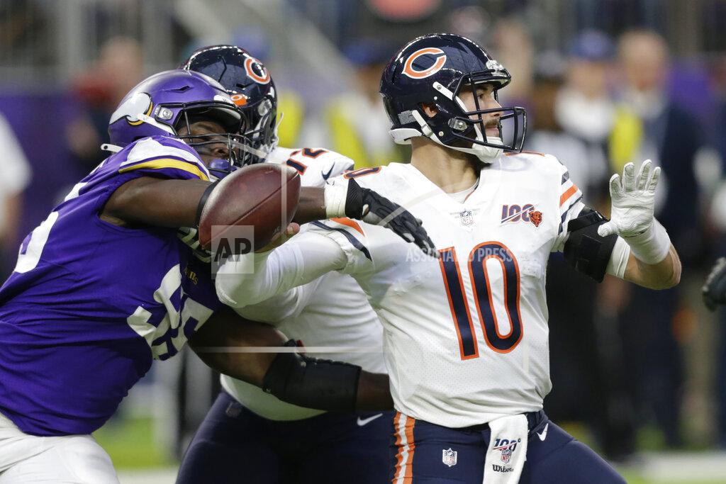 Andy Clayton-King Chicago Bears quarterback Mitchell Trubisky (10) fumbles as he is hit by Minnesota Vikings defensive end Ifeadi Odenigbo, left, during the second half of an NFL football game, Sunday, Dec. 29, 2019, in Minneapolis. Odenigbo recovered the fumble. (AP Photo/Andy Clayton-King)