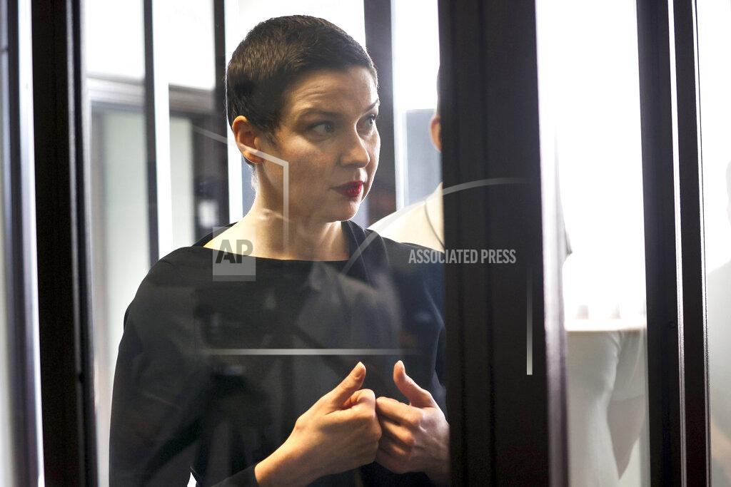 Ramil Nasibulin Belarus' opposition activists Maria Kolesnikova attends a court hearing in Minsk, Belarus, Wednesday, Aug. 4, 2021. Kolesnikova resisted the authorities' attempts to force her to leave Belarus and ripped her passport when officers of the Belarusian security agency tried to forcibly expel her in September of 2020. (Ramil Nasibulin/BelTA pool photo via AP)