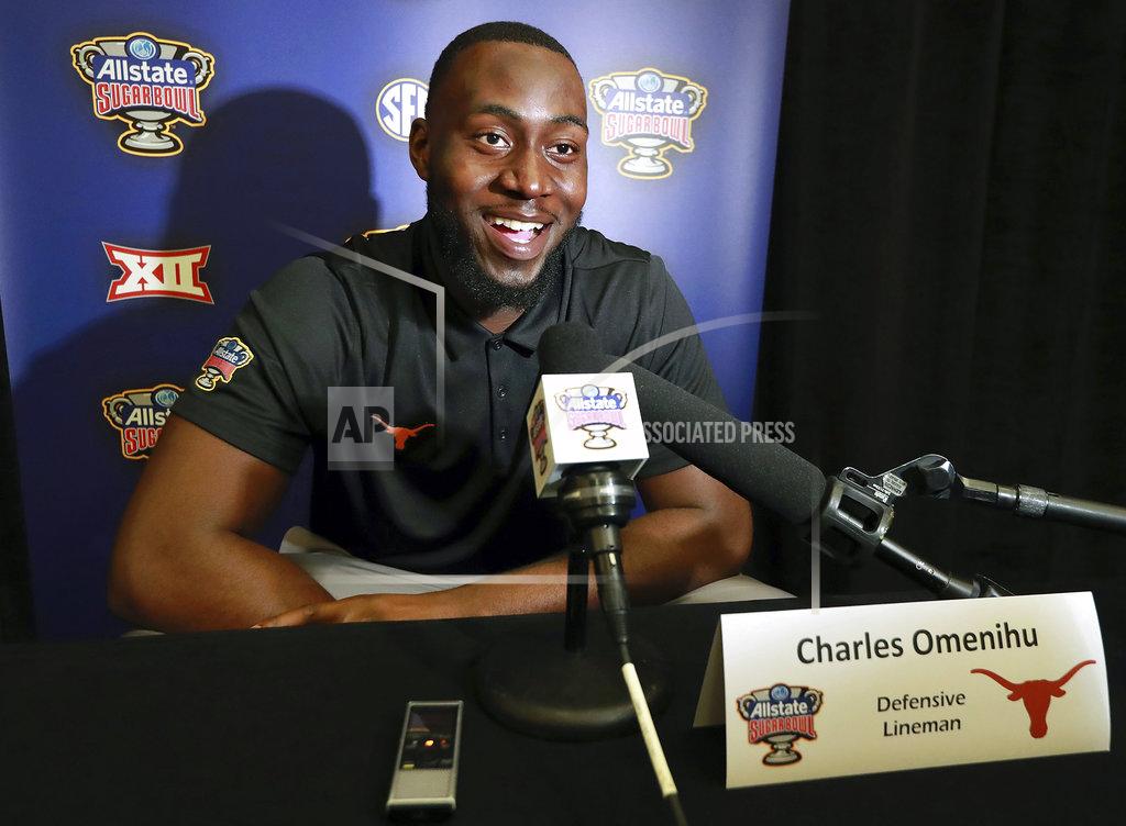 Curtis Compton Texas defensive lineman Charles Omenihu takes questions during a news conference, Sunday, Dec. 30, 2018 in New Orleans. No. 6 Georgia, No. 14 Texas meet in Sugar Bowl on Tuesday, Jan., 1, 2019. (Curtis Compton/Atlanta Journal-Constitution via AP)
