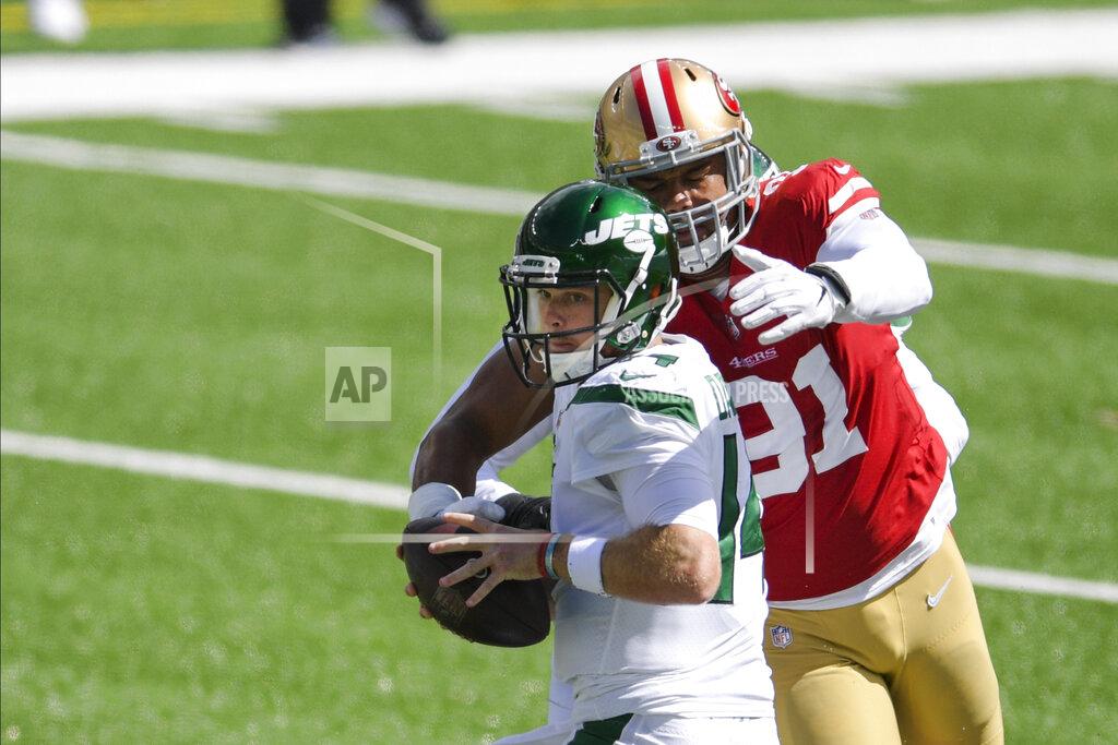 Bill Kostroun San Francisco 49ers defensive end Arik Armstead (91) sacks New York Jets quarterback Sam Darnold (14) during the first half of an NFL football game Sunday, Sept. 20, 2020, in East Rutherford, N.J. (AP Photo/Bill Kostroun)