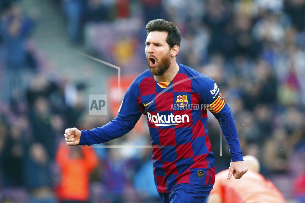 Joan Monfort FILE - In this Saturday, Feb. 22, 2020 file photo, Barcelona's Lionel Messi celebrates after scoring his side's opening goal during a Spanish La Liga soccer match between Barcelona and Eibar at the Camp Nou stadium in Barcelona, Spain. panish Prime Minister Pedro Sánchez announced Saturday, May 23, 2020 that the soccer league in Spain will be allowed to resume from June 8. While the top tier, La Liga, can play from this date, it has already said it wants to resume play on June 12. It is unclear when the first games will be held. There has been no play in the top tier since March 12 due to the coronavirus crisis. (AP Photo/Joan Monfort, File)