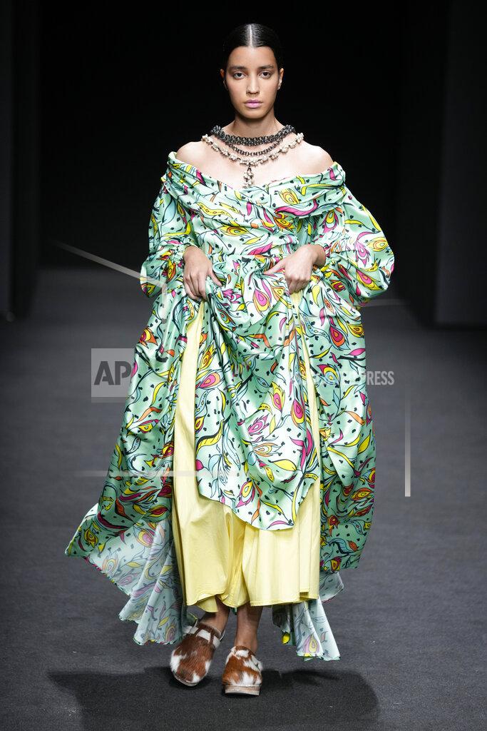 Luca Bruno A model wears a creation of Joy Meribe's Spring Summer 2022 collection, unveiled during the Milan Fashion Week, in Milan, Italy, Wednesday, Sept. 22, 2021. (AP Photo/Luca Bruno)