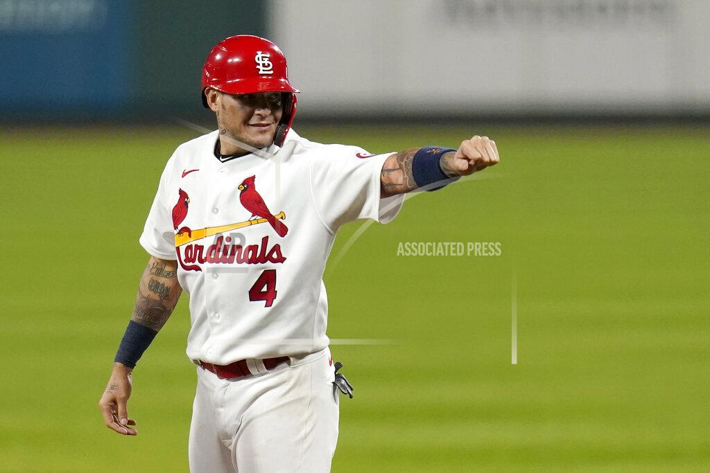 Jeff Roberson St. Louis Cardinals' Yadier Molina celebrates after hitting a single for his 2,000th career hit during the seventh inning of a baseball game against the Milwaukee Brewers Thursday, Sept. 24, 2020, in St. Louis. (AP Photo/Jeff Roberson)