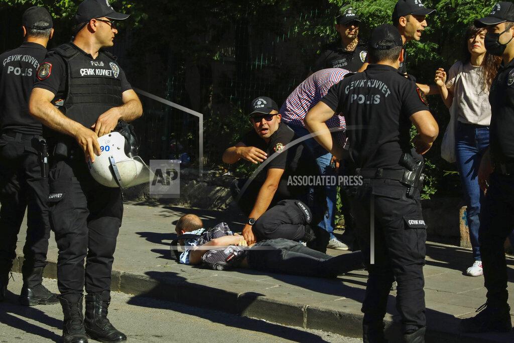 Ali Unal A man is detained during the LGBTQ Pride March in Ankara, Turkey, Tuesday, July 5, 2022. Police in Turkey’s capital have broken up a LGBTQ Pride march and detained dozens of people. Turkish authorities have banned LGBTQ events. (AP Photo/Ali Unal)