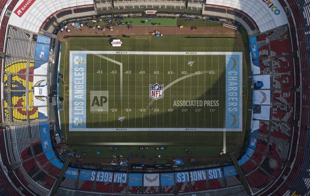 An aerial view of the Azteca Stadium in Mexico City, Saturday, Nov. 16, 2019, where the Kansas City Chiefs and Los Angeles Rams will face off for a regular-season Monday Night Football game. Heavy rain and heavy use last year left the grass unfit for the AFC matchup, forcing the Chiefs-Rams game to be relocated to Los Angeles. (AP Photo/Christian Palma)