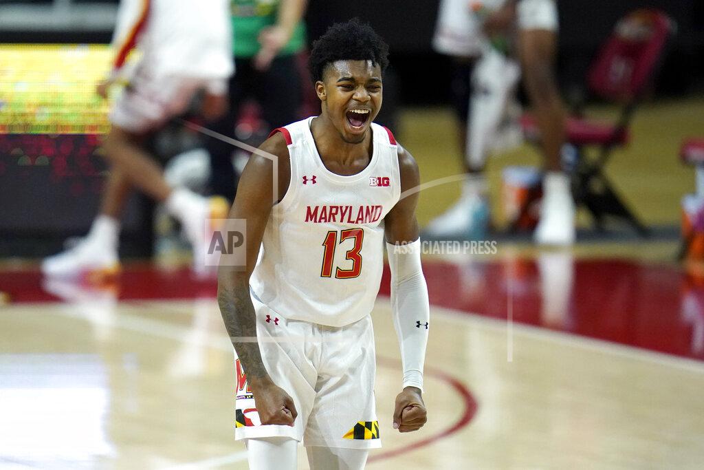 Julio Cortez Maryland guard Hakim Hart reacts after scoring a three-point shot against St. Peter's during the first half of an NCAA college basketball game, Friday, Dec. 4, 2020, in College Park, Md. (AP Photo/Julio Cortez)