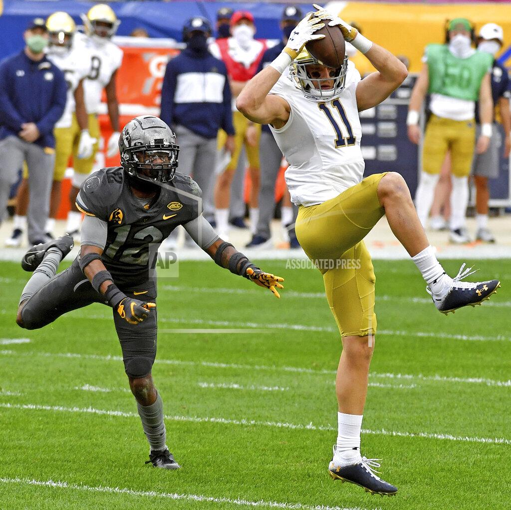Matt Freed Notre Dame wide receiver Ben Skowronek pulls in a pass for a touchdown against Pitt defensive back Paris Ford in the first quarter at Heinz Field Saturday, Oct. 24, 2020, in Pittsburgh. (Matt Freed/Pittsburgh Post-Gazette via AP)