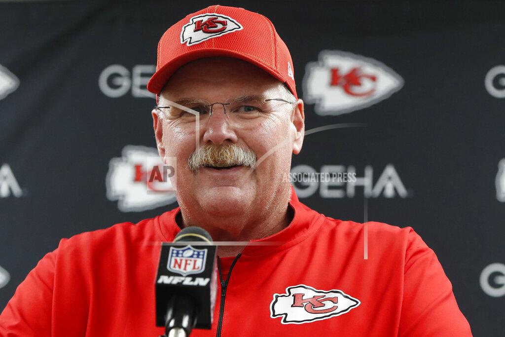 Don Wright FILE - In this Aug. 17, 2019 file photo, Kansas City Chiefs coach Andy Reid speaks at a news conference after the team's preseason NFL football game against the Pittsburgh Steelers in Pittsburgh. "Modern Family" star Eric Stonestreet plays the part of the bumbling younger brother of Reid in a new spoof video that was released in advance of the first game of the regular season.(AP Photo/Don Wright, File)