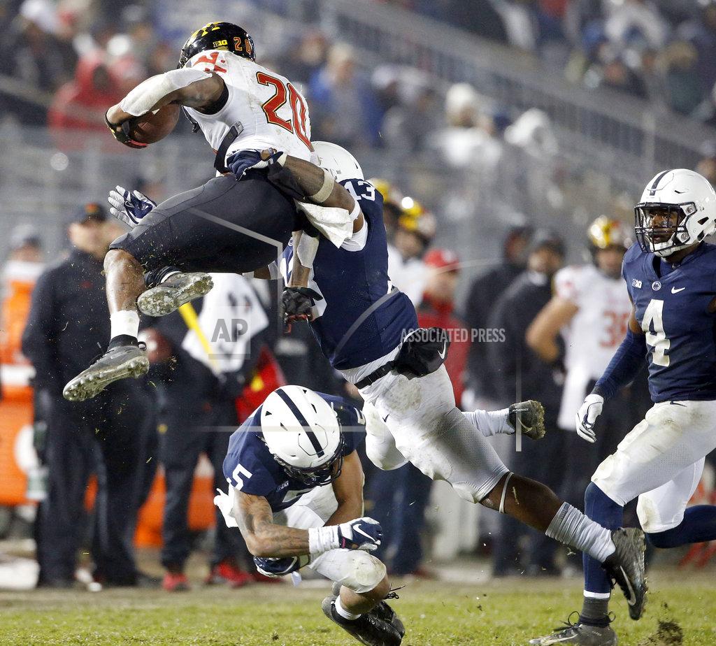 Chris Knight Penn State's Ellis Brooks (13) and Tariq Castro-Fields (5) bring down Maryland's Javon Leake (20) during the second half of an NCAA college football game in State College, Pa., Saturday, Nov. 24, 2018. Penn State won 38-3. (AP Photo/Chris Knight)