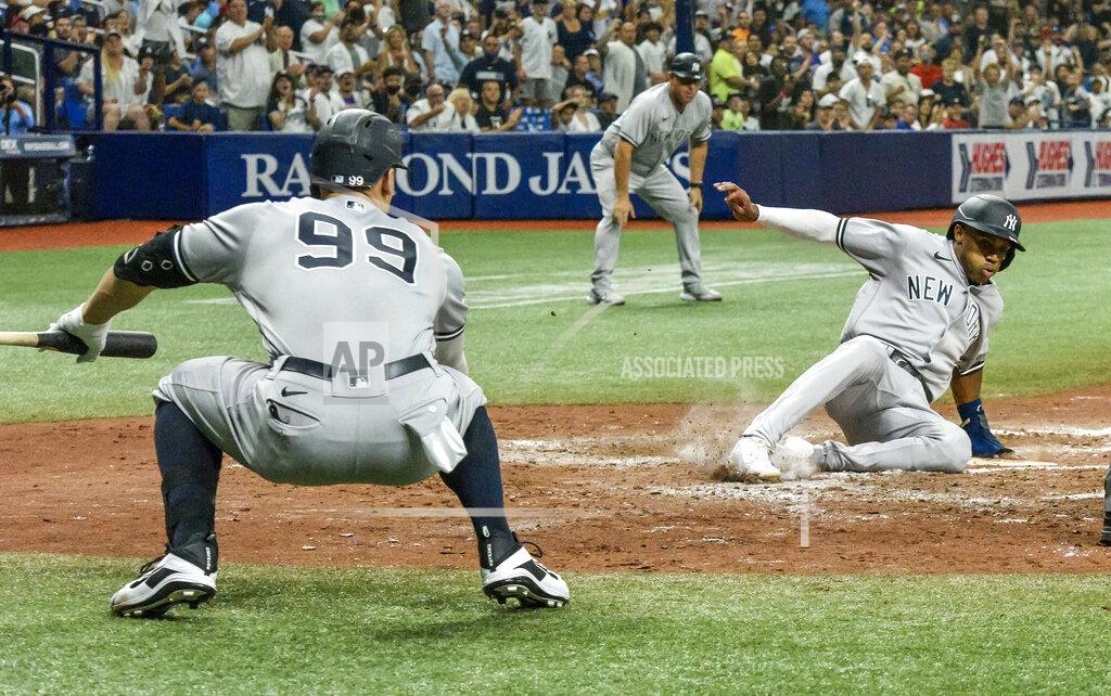 Steve Nesius New York Yankees' Aaron Judge (99) watches as Greg Allen, right, scores on a DJ LeMahieu's RBI single off Tampa Bay Rays starter Shane McClanahan during the fifth inning of a baseball game Tuesday, July 27, 2021, in St. Petersburg, Fla. (AP Photo/Steve Nesius)