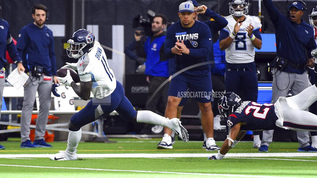 Eric Christian Smith Tennessee Titans wide receiver A.J. Brown (11) breaks away from Houston Texans cornerback Vernon III Hargreaves (28) to score a touchdown after catching a pass during the first half of an NFL football game Sunday, Dec. 29, 2019, in Houston. (AP Photo/Eric Christian Smith)