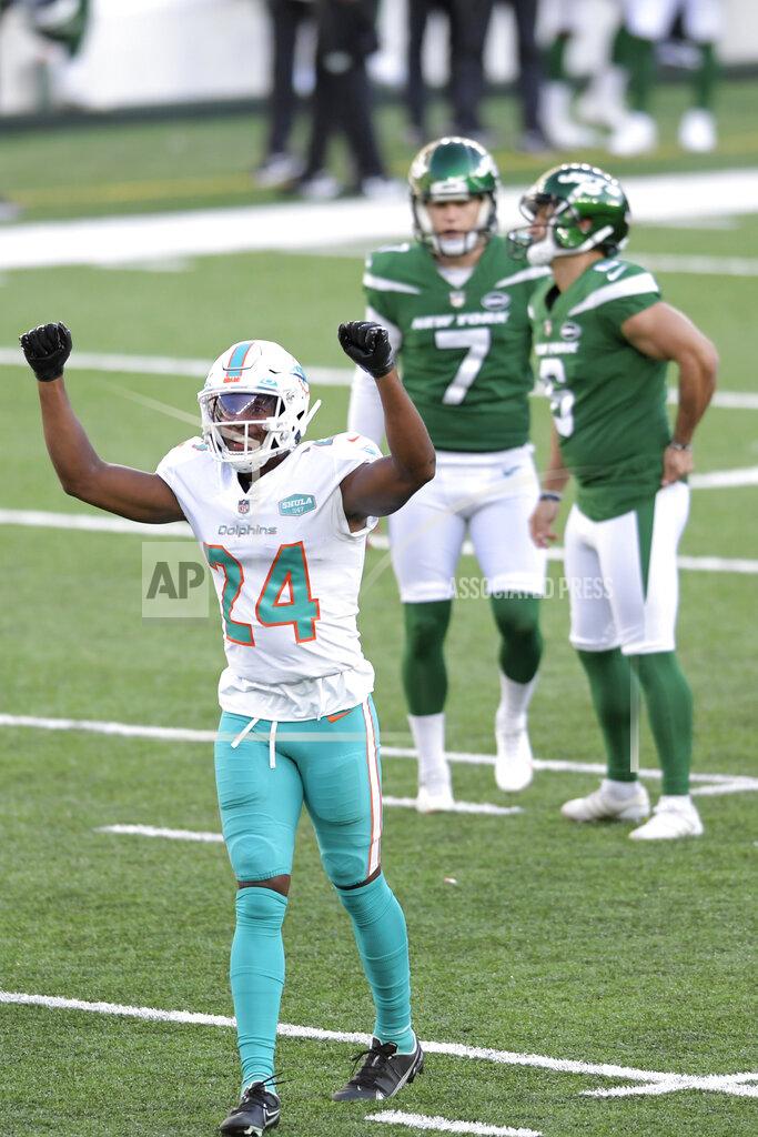 Bill Kostroun Miami Dolphins' Byron Jones (24) reacts after New York Jets' kicker Sergio Castillo, back right, missed a field goal during the first half of an NFL football game, Sunday, Nov. 29, 2020, in East Rutherford, N.J. (AP Photo/Bill Kostroun)