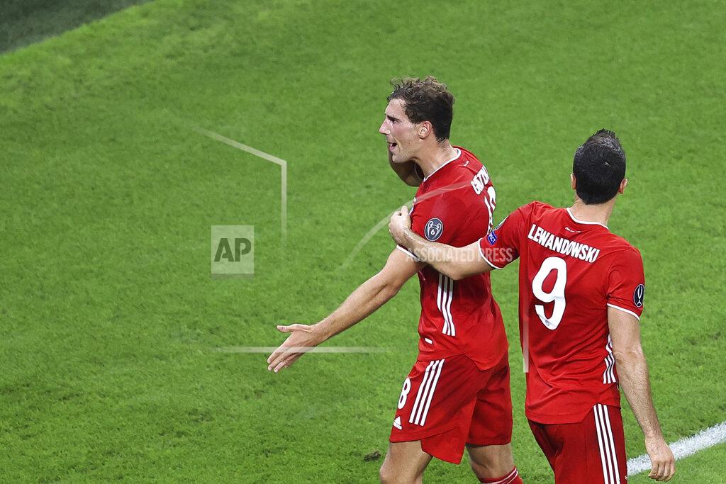 Laszlo Szirtesi Bayern's Leon Goretzka celebrates scoring his side's first goal during the UEFA Super Cup soccer match between Bayern Munich and Sevilla at the Puskas Arena in Budapest, Hungary, Thursday, Sept. 24, 2020. (Laszlo Szirtesi/Pool via AP)