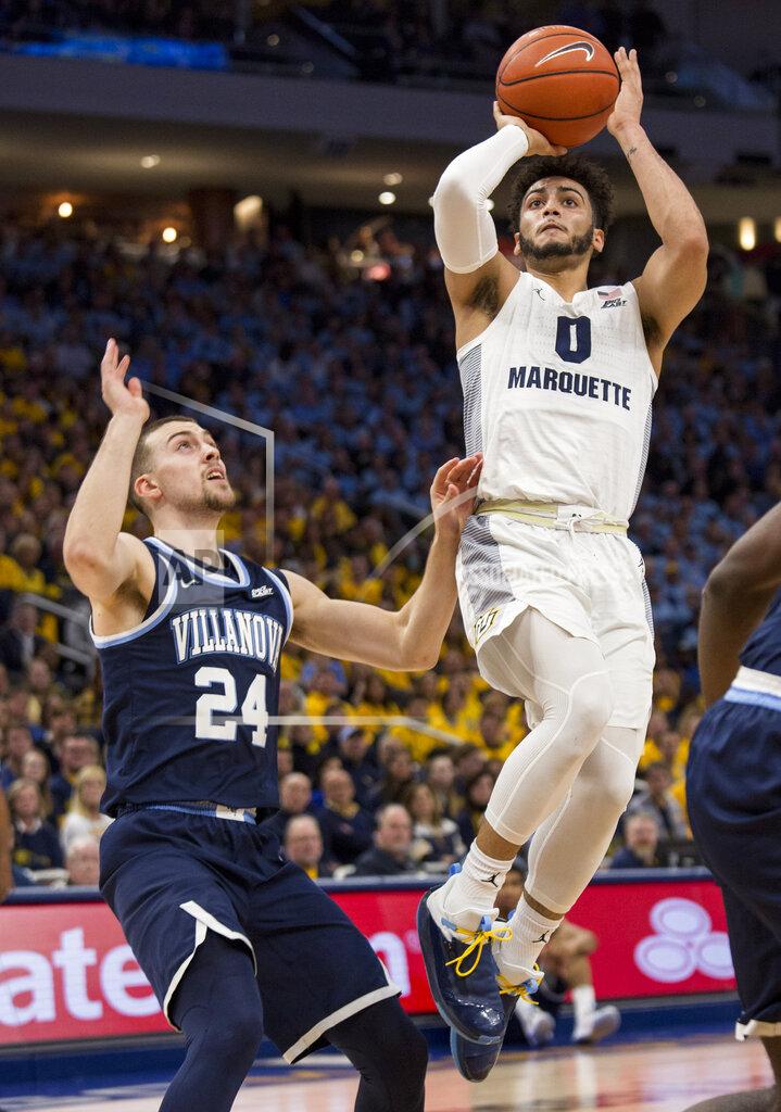 Darren Hauck Marquette guard Markus Howard, right, goes up for a basket against Villanova guard Joe Cremo, left, during the first half of an NCAA college basketball game Saturday, Feb. 9, 2019, in Milwaukee. (AP Photo/Darren Hauck)