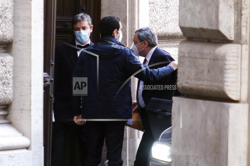 Mauro Scrobogna Mario Draghi, right, arrives at the Chamber of Deputies in Rome, Monday, Feb. 8, 2021. Former European Central Bank chief Draghi is consulting Italy’s fractious parties after being tapped by President Sergio Mattarella to try to pull together a government to guide the debt-riddled country through the health and economic crises it is confronting. (Mauro Scrobogna/LaPresse via AP)