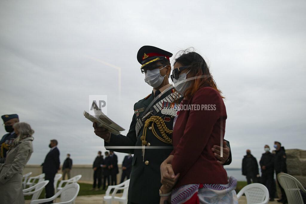 Emrah Gurel Dignitaries and military personnel attend a ceremony to commemorate soldiers who died during the World War I campaign on the Gallipoli peninsula, in Canakkale, Turkey, Saturday, April 24, 2021, a day ahead of the 106th anniversary of the Gallipoli Campaign.The Gallipoli Campaign of 1915 by Allied forces aimed to take control of the peninsula to weaken the Ottoman Empire. The campaign failed and Allied forces withdrew after eight months of fighting on the ground and some 250,000 casualties on both sides. The memorials were kept small due to the COVID-19 pandemic.(AP Photo/Emrah Gurel)