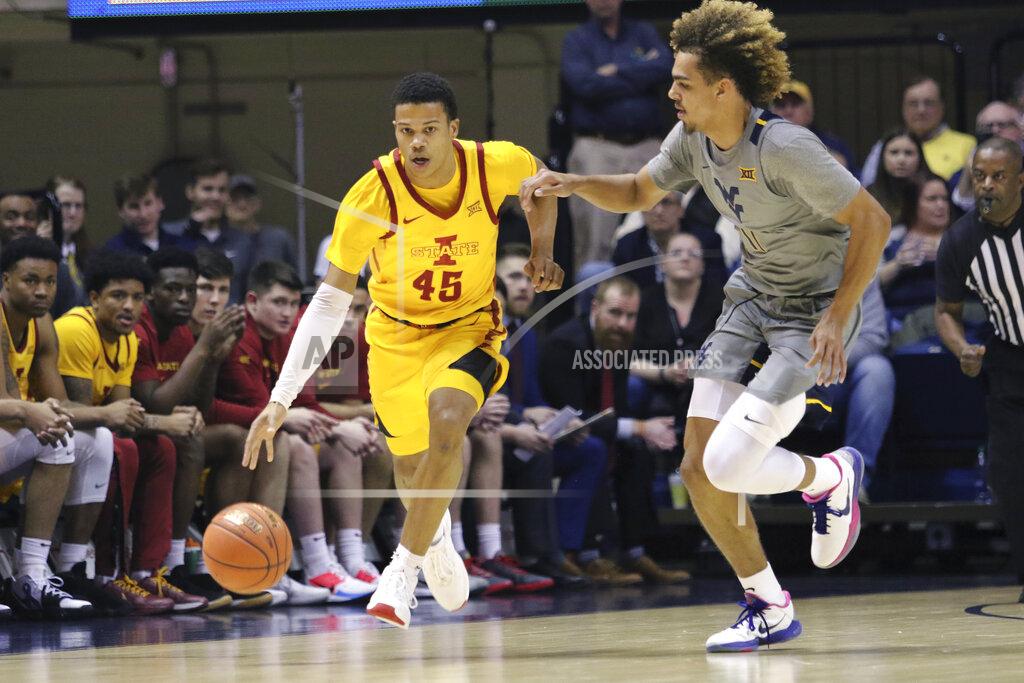 Kathleen Batten Iowa State guard Rasir Bolton (45) drives up court as he is defended by West Virginia forward Emmitt Matthews Jr. (11) during the second half of an NCAA college basketball game Wednesday, Feb. 5, 2020, in Morgantown, W.Va. (AP Photo/Kathleen Batten)