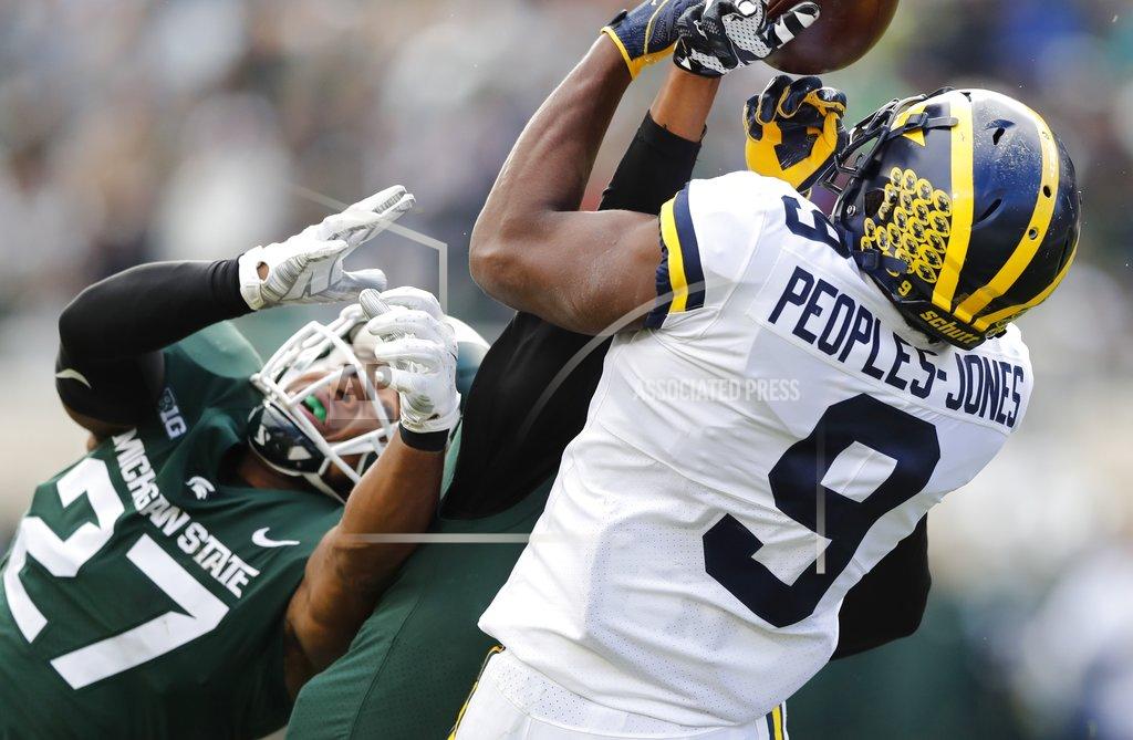 Carlos Osorio Michigan State safeties Xavier Henderson and Khari Willis (27) break up a pass intended for Michigan wide receiver Donovan Peoples-Jones (9) during the first half of an NCAA college football game, Saturday, Oct. 20, 2018, in East Lansing, Mich. (AP Photo/Carlos Osorio)