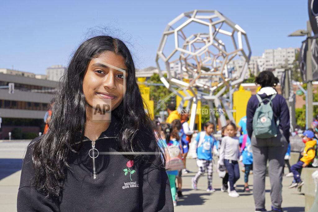 Eric Risberg Hansika Daggolu, an incoming junior at Mission San Jose High School, poses in San Francisco, Tuesday, June 28, 2022. Middle and high school students in California will be able to sleep a little bit later when the new school year starts. Hansika, 15, said she is happy she will no longer have to rise before 7 a.m. herself to get to school by 8 a.m. The overall mood, she suspects, will lift as well. (AP Photo/Eric Risberg)