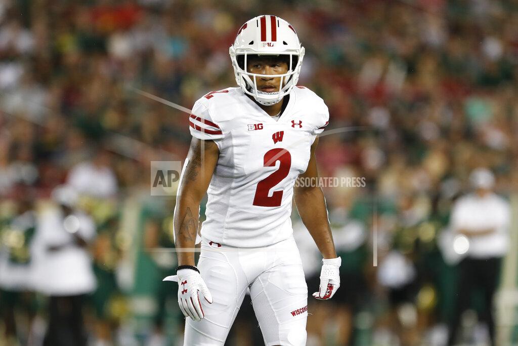 Mark Lomoglio Wisconsin safety Reggie Pearson (2) waits for action during an NCAA football game on Friday, Aug. 30, 2019 in Tampa, Fla. Wisconsin has welcomed back offensive lineman Jon Dietzen and lost Pearson as it resumes practice to prepare for the pandemic-delayed season. The Badgers released a roster Wednesday, Sept. 23, 2020 that didn’t include Pearson but added Dietzen, who had announced in February 2019 that he was stepping away from football due to injuries.(AP Photo/Mark Lomoglio, file)