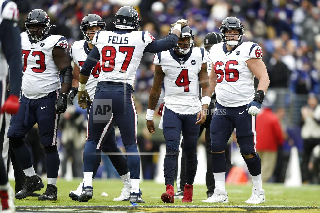Gail Burton Houston Texans tight end Darren Fells (87) taps quarterback Deshaun Watson (4) after Watson lost a fumble on a sack against the Baltimore Ravens during the first half of an NFL football game, Sunday, Nov. 17, 2019, in Baltimore. (AP Photo/Gail Burton)