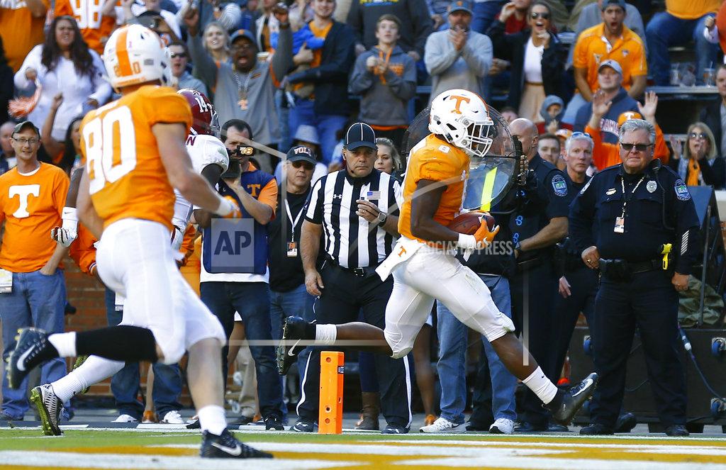 Wade Payne Tennessee running back Ty Chandler (8) scores a touchdown in the first half of an NCAA college football game against Alabama Saturday, Oct. 20, 2018, in Knoxville, Tenn. (AP Photo/Wade Payne)