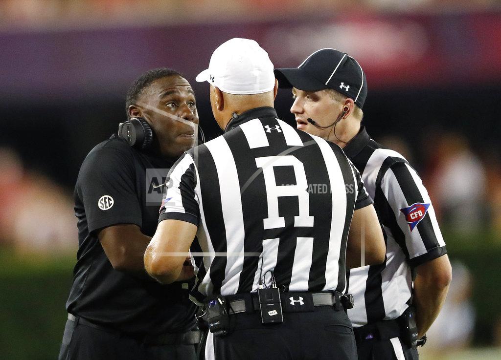 John Bazemore Vanderbilt coach Derek Mason talks with officials during the first half of the teams NCAA college football game against Georgia on Saturday, Oct. 6, 2018, in Atlanta. (AP Photo/John Bazemore)