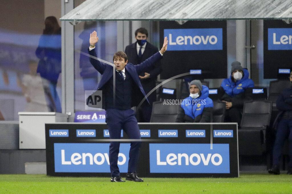 Luca Bruno Inter Milan's head coach Antonio Conte follows the Serie A soccer match between Inter Milan and Spezia, at the San Siro Stadium in Milan, Italy, Sunday, Dec. 20, 2020. (AP Photo/Luca Bruno)