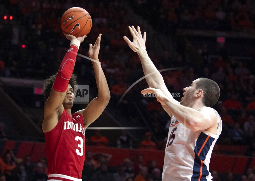 Stephen Haas Indiana forward Justin Smith (3) shoots against Illinois forward Giorgi Bezhanishvili (15) during the second half of an NCAA college basketball game in Champaign, Ill., Thursday, March 7, 2019. (AP Photo/Stephen Haas)