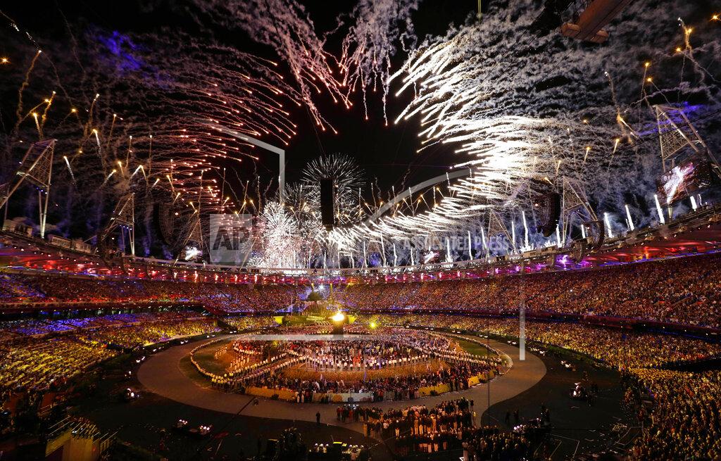 Paul Sancya The Olympic cauldron is lit during the Opening Ceremony at the 2012 Summer Olympics, Saturday, July 28, 2012, in London. (AP Photo/Paul Sancya)