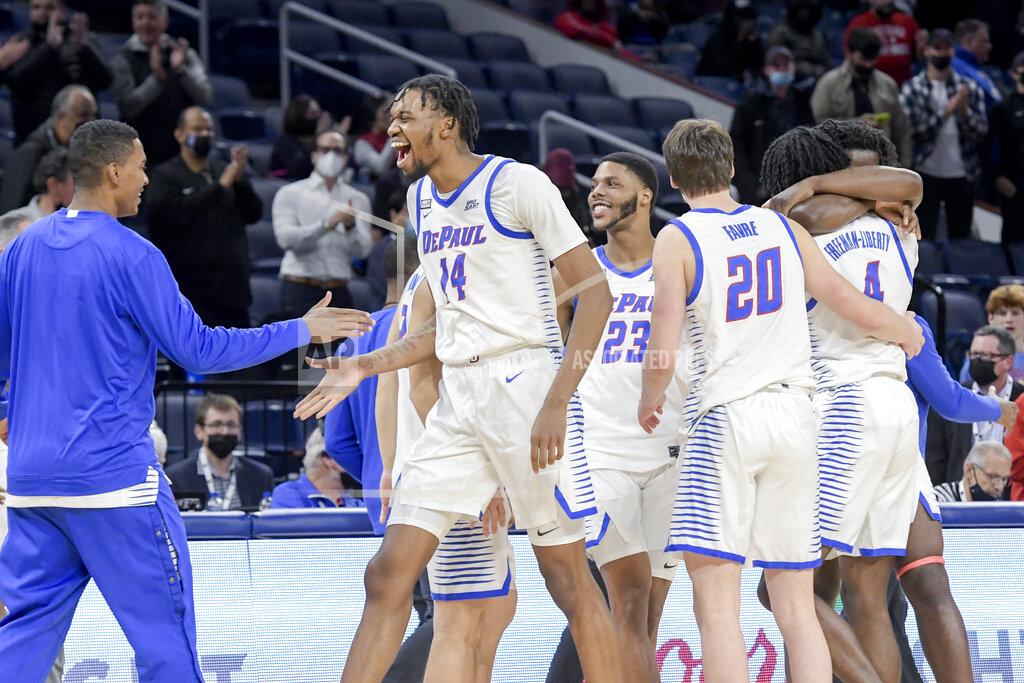 Mark Black DePaul celebrates their win over Rutgers during an NCAA college basketball game Thursday, Nov. 18, 2021, in Chicago. (AP Photo/Mark Black)