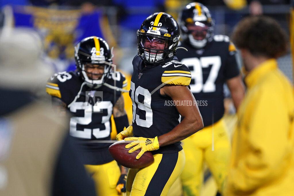 Keith Srakocic Pittsburgh Steelers free safety Minkah Fitzpatrick (39) celebrates his touchdown after intercepting a pass from Los Angeles Rams quarterback Jared Goff during the first half of an NFL football game in Pittsburgh, Sunday, Nov. 10, 2019. (AP Photo/Keith Srakocic)