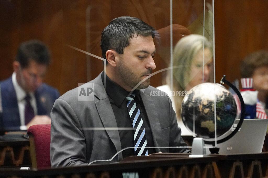 Matt York Republican Rep. Leo Biasiucci, reads over legislation at the Capitol, Thursday, Feb. 18, 2021, in Phoenix. In Arizona, a Senate proposal that passed the chamber on Wednesday, March 3, 2021, would allow police officers to be sued for enforcing federal gun restrictions that the state considers violations of the Second Amendment. They potentially could face criminal charges. A bill in the House doesn't include those punishments, but its sponsor, Biasiucci, said it would be a clear rejection of federal restrictions on assault-style weapons, high-capacity magazines or other firearms. (AP Photo/Matt York)
