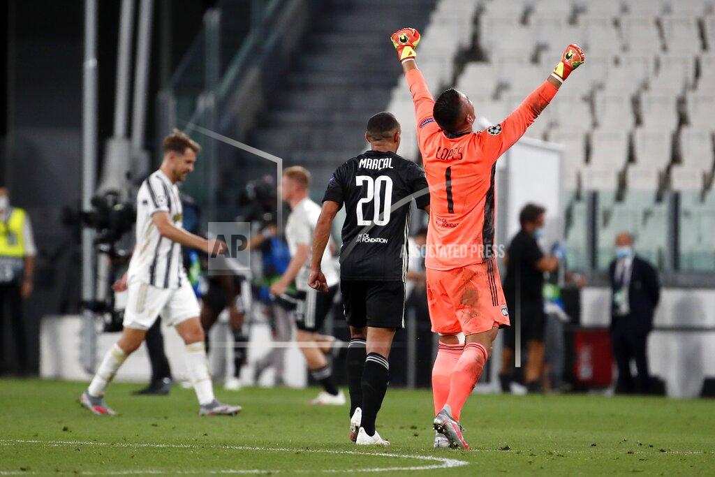 Antonio Calanni Lyon's goalkeeper Anthony Lopes celebrates after the Champions League round of 16 second leg, soccer match between Juventus and Lyon at the Allianz stadium in Turin, Italy, Friday, Aug. 7, 2020. Lyon will play in the quarter finals. (AP Photo/Antonio Calanni)