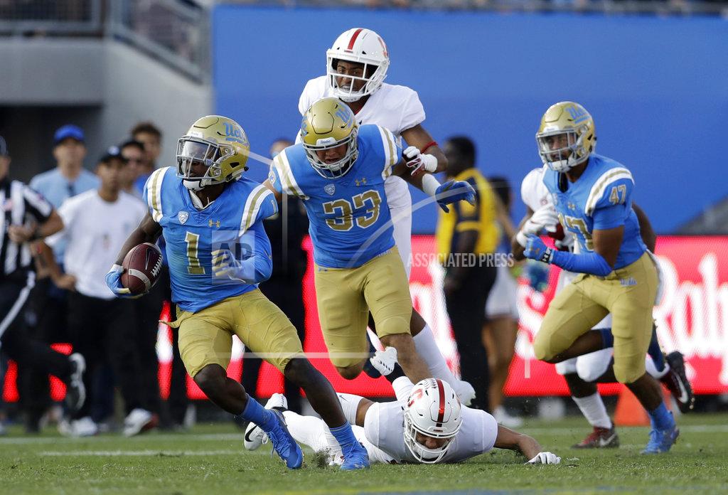 Marcio Jose Sanchez UCLA's Darnay Holmes (1) returns a kick for a touchdown during the second half of an NCAA college football game against Stanford Saturday, Nov. 24, 2018, in Pasadena, Calif. (AP Photo/Marcio Jose Sanchez)