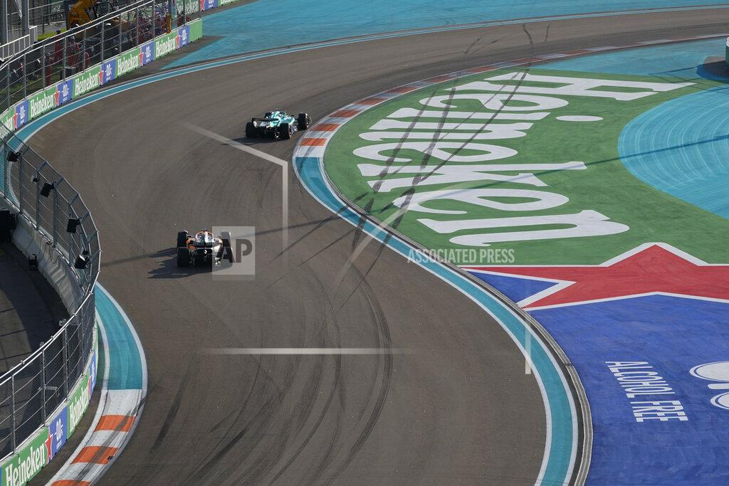 Darron Cummings McLaren driver Daniel Ricciardo of Australia and Aston Martin driver Lance Stroll of Canada drive around the circuit during the second practice session for the Formula One Miami Grand Prix auto race at the Miami International Autodrome, Friday, May 6, 2022, in Miami Gardens, Fla. (AP Photo/Darron Cummings)