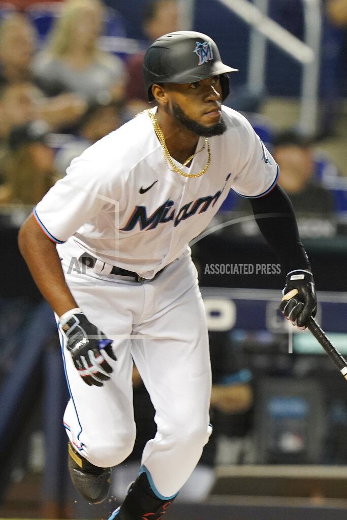Marta Lavandier Miami Marlins' Bryan De La Cruz watches his hit during the first inning of a baseball game against the Washington Nationals, Tuesday, Sept. 21, 2021, in Miami. (AP Photo/Marta Lavandier)