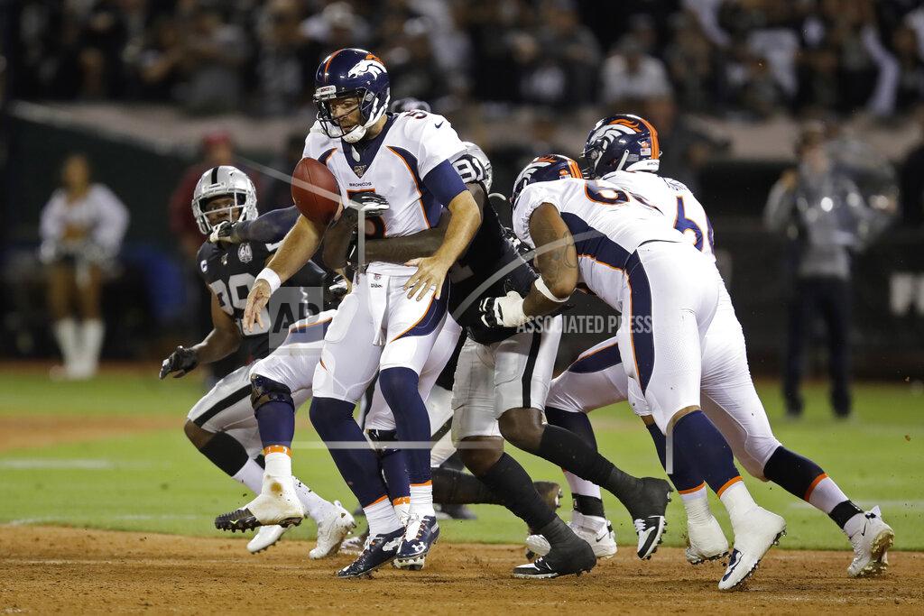 Ben Margot Denver Broncos quarterback Joe Flacco is sacked by Oakland Raiders defensive end Benson Mayowa during the first half of an NFL football game Monday, Sept. 9, 2019, in Oakland, Calif. (AP Photo/Ben Margot)