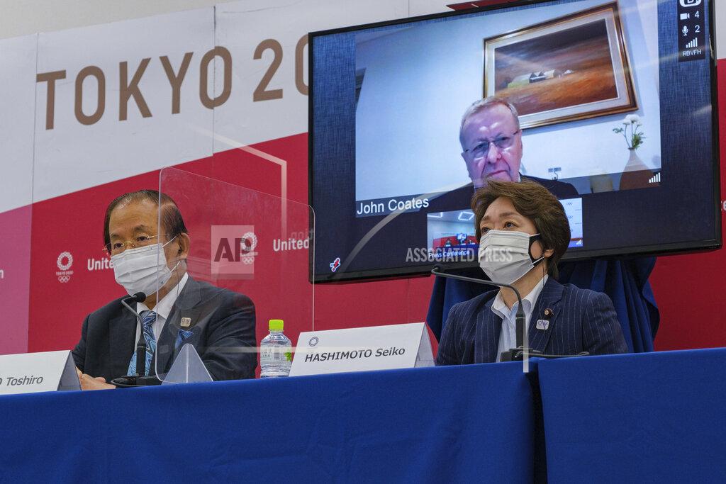 Nicolas Datiche CEO of the Tokyo 2020 Toshiro Muto, left, Chairman of the Coordination Commission for the Games of the XXXII Olympiad Tokyo 2020 John Coates, (on screen) and President of the Tokyo 2020 Seiko Hashimoto, attend the Tokyo 2020 IOC Coordination Commission press conference on Friday, May 21, 2021 in Tokyo.(Nicolas Datiche/Pool Photo via AP)