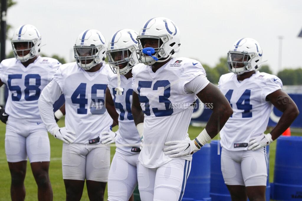 Michael Conroy Indianapolis Colts outside linebacker Darius Leonard (53) leads a group of defensive players as they run a drill during practice at the NFL team's football training camp in Westfield, Ind., Friday, July 26, 2019. (AP Photo/Michael Conroy)