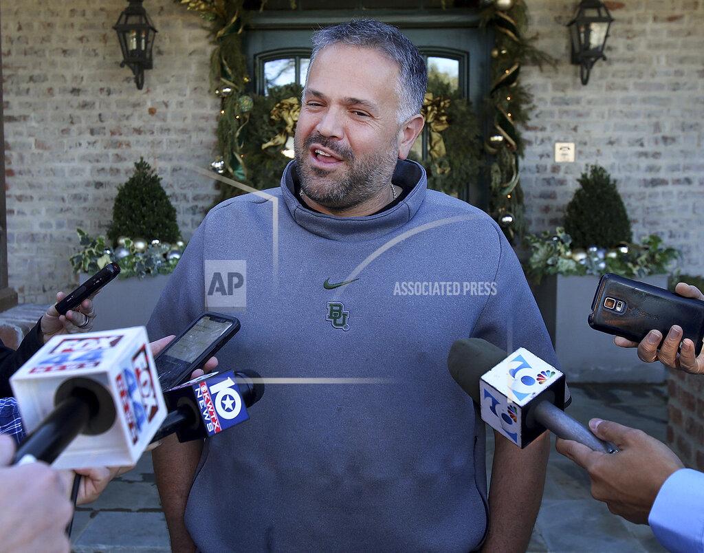 Jerry Larson Former Baylor head football coach Matt Rhule speaks to reporters outside his home Tuesday Jan. 7, 2020, in Waco, Texas. According to a person familiar with the situation, the Carolina Panthers are completing a contract to hire Baylor's Matt Rhule as their coach. The Panthers have not spoken publicly about the coaching search.(Jerry Larson/Waco Tribune-Herald via AP)