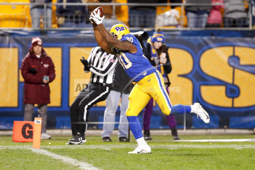 Keith Srakocic Pittsburgh running back Qadree Ollison (30) starts to sommersault as he goes into the end zone for a touchdown after a 97-yard run from scrimmage against Virginia Tech in the fourth quarter of an NCAA football game, Saturday, Nov. 10, 2018, in Pittsburgh. Pittsburgh won 52-22. (AP Photo/Keith Srakocic)