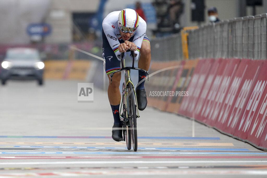 Luca Bruno Reigning World Champion Italy's Filippo Ganna competes during the final stage of the Giro d'Italia cycling race, a 15.7 kilometers (9.756 miles) individual time trial from Cernusco sul Naviglio to Milan, Italy, Sunday, Oct. 25, 2020. (AP Photo/Luca Bruno)