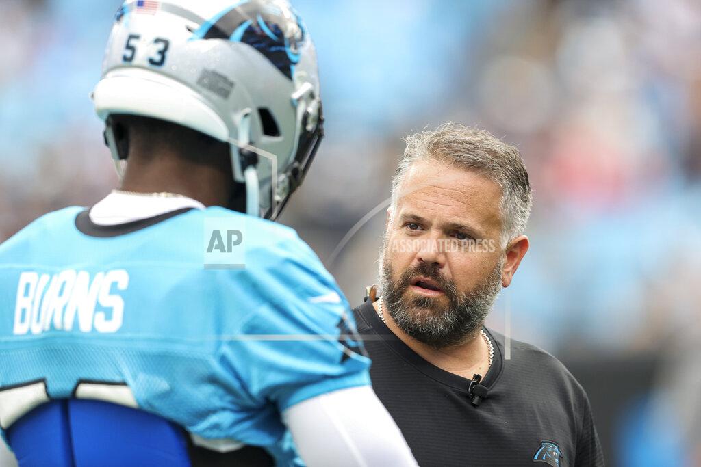 Nell Redmond Carolina Panthers head coach Matt Rhule, right, talks to Carolina Panthers defensive end Brian Burns during a Fan Fest practice at the NFL football team's training camp in Charlotte, N.C., Friday, Aug. 6, 2021. (AP Photo/Nell Redmond)