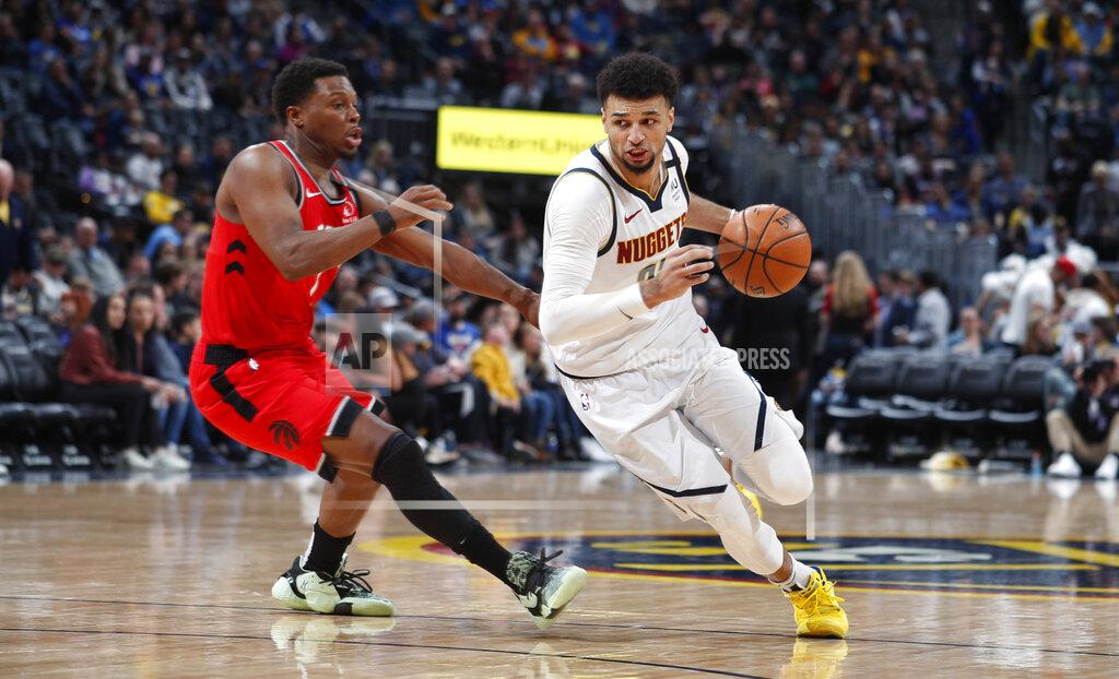 David Zalubowski FILE - Denver Nuggets guard Jamal Murray, right, rives past Toronto Raptors guard Kyle Lowry in the second half of an NBA basketball game in Denver, in this Sunday, March 1, 2020, file photo. The Nuggets will open the NBA basketball exhibition season with two home contests against the Portland Trailblazers this week. (AP Photo/David Zalubowski, File)