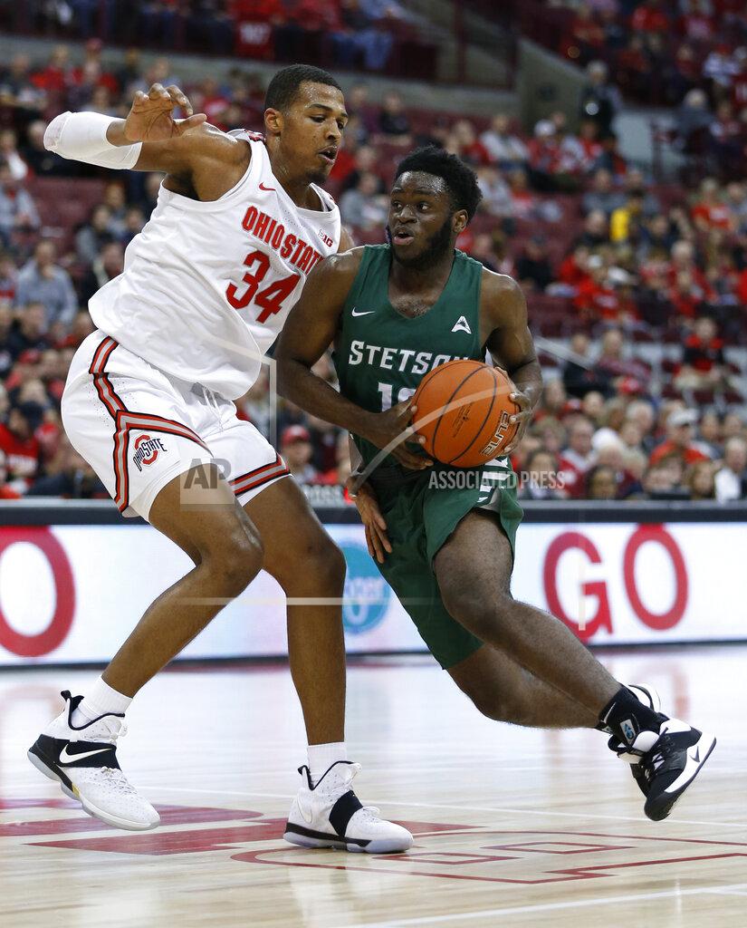 Jay Laprete Stetson's Kenny Aninye, right, drives to the basket as Ohio State's Kaleb Wesson defends during the first half of an NCAA college basketball game Monday, Nov. 18, 2019, in Columbus, Ohio. (AP Photo/Jay LaPrete)