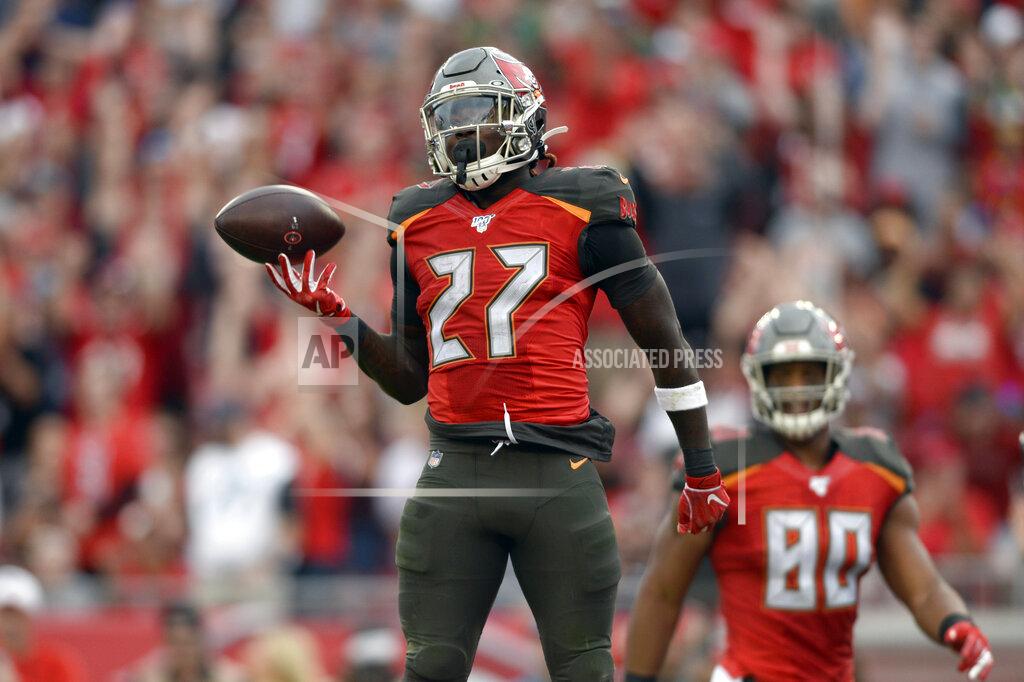 Jason Behnken Tampa Bay Buccaneers running back Ronald Jones II (27) celebrates his 4-yard score against the Houston Texans during the first half of an NFL football game Saturday, Dec. 21, 2019, in Tampa, Fla. (AP Photo/Jason Behnken)
