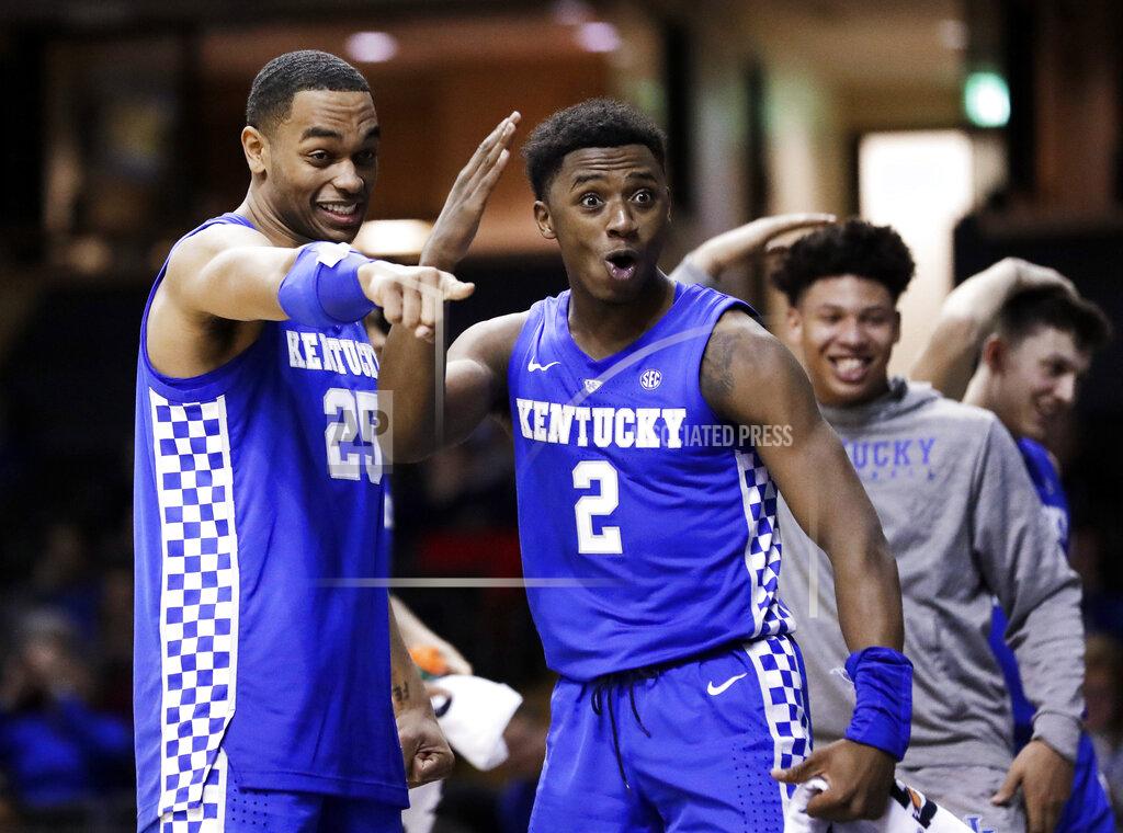 Mark Humphrey Kentucky forward PJ Washington (25) and guard Ashton Hagans (2) celebrate in the final seconds of the team's NCAA college basketball game against Vanderbilt on Tuesday, Jan. 29, 2019, in Nashville, Tenn. Kentucky won 87-52. (AP Photo/Mark Humphrey)