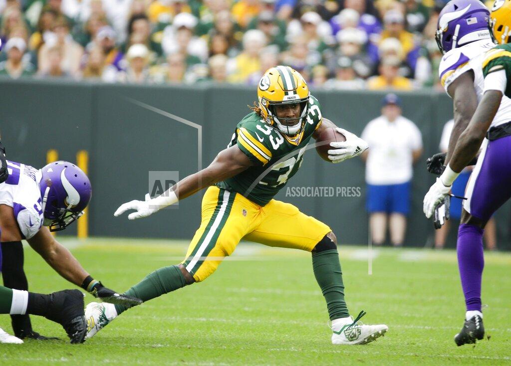 Mike Roemer Green Bay Packers' Aaron Jones runs during the first half of an NFL football game against the Minnesota Vikings Sunday, Sept. 15, 2019, in Green Bay, Wis. (AP Photo/Mike Roemer)