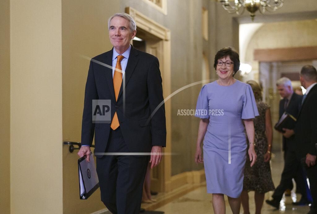 J. Scott Applewhite Sen. Rob Portman, R-Ohio, left, and Sen. Susan Collins, R-Maine, smile as they emerge from the office of Senate Republican Leader Mitch McConnell to announce agreement with Democrats on a $1 trillion infrastructure bill and are ready to vote to take up the bill, at the Capitol in Washington, Wednesday, July 28, 2021. (AP Photo/J. Scott Applewhite)